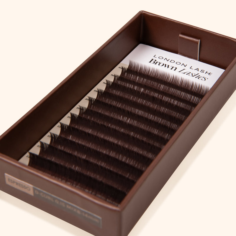 super dark mink eyelash extensions inside brown lash tray