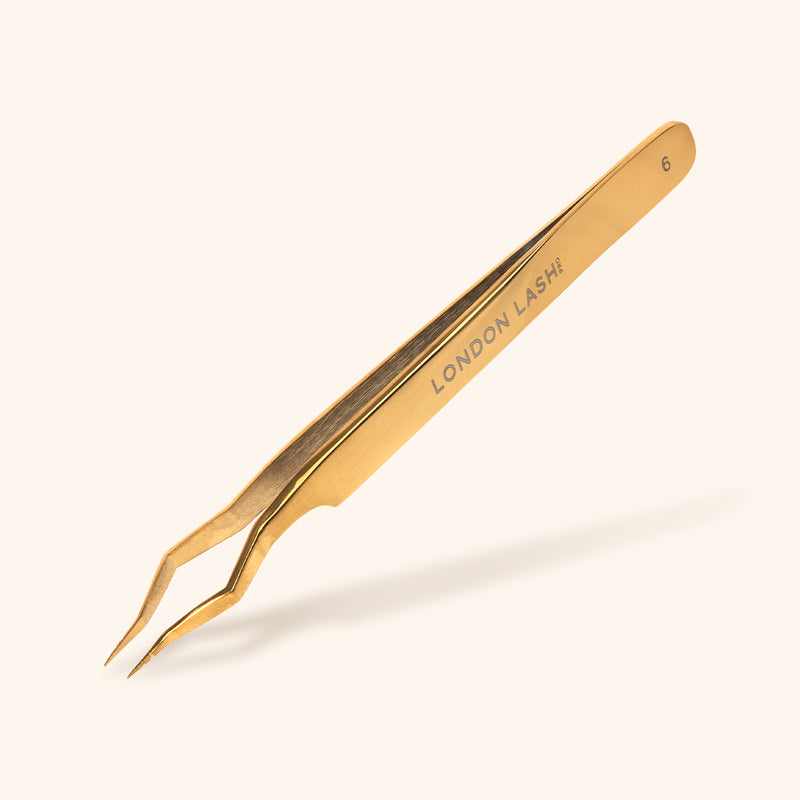 gold colour isolation tweezers with sharp tips and wider boot for easy and quick isolation