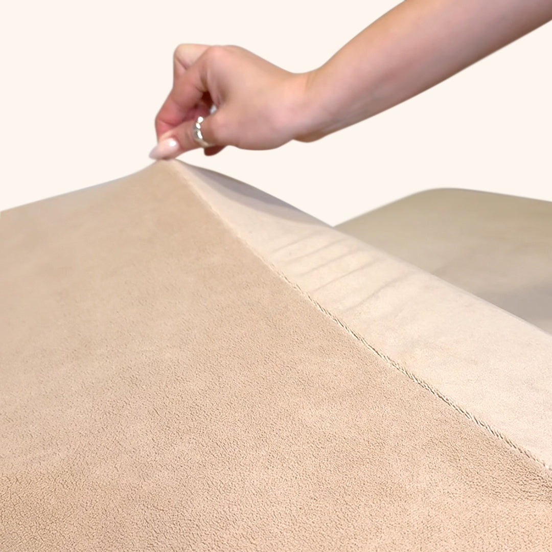 Woman touching a soft teddy bear bed cover