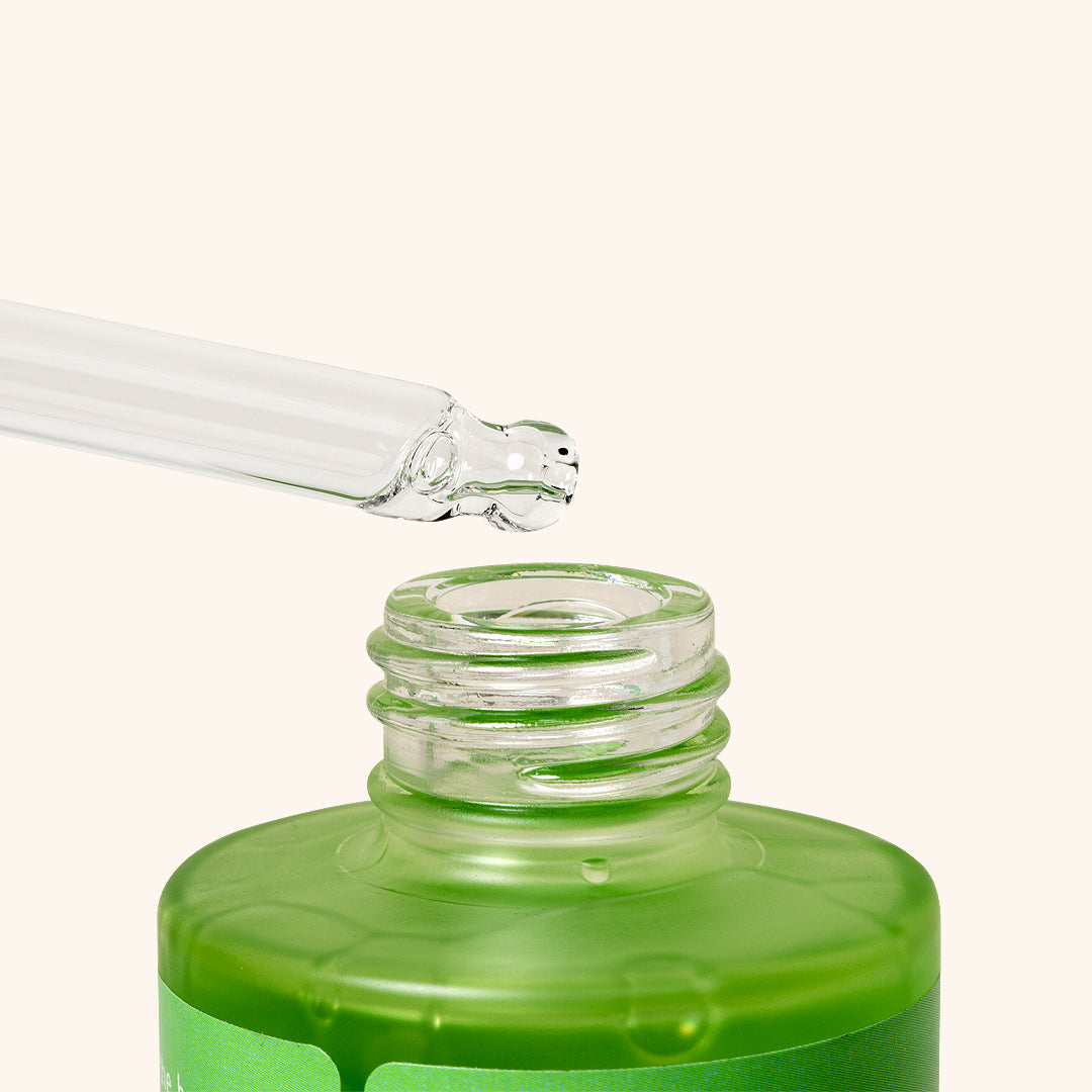 green 100ml pipet bottle with green packaging on the side for So Henna coconut water