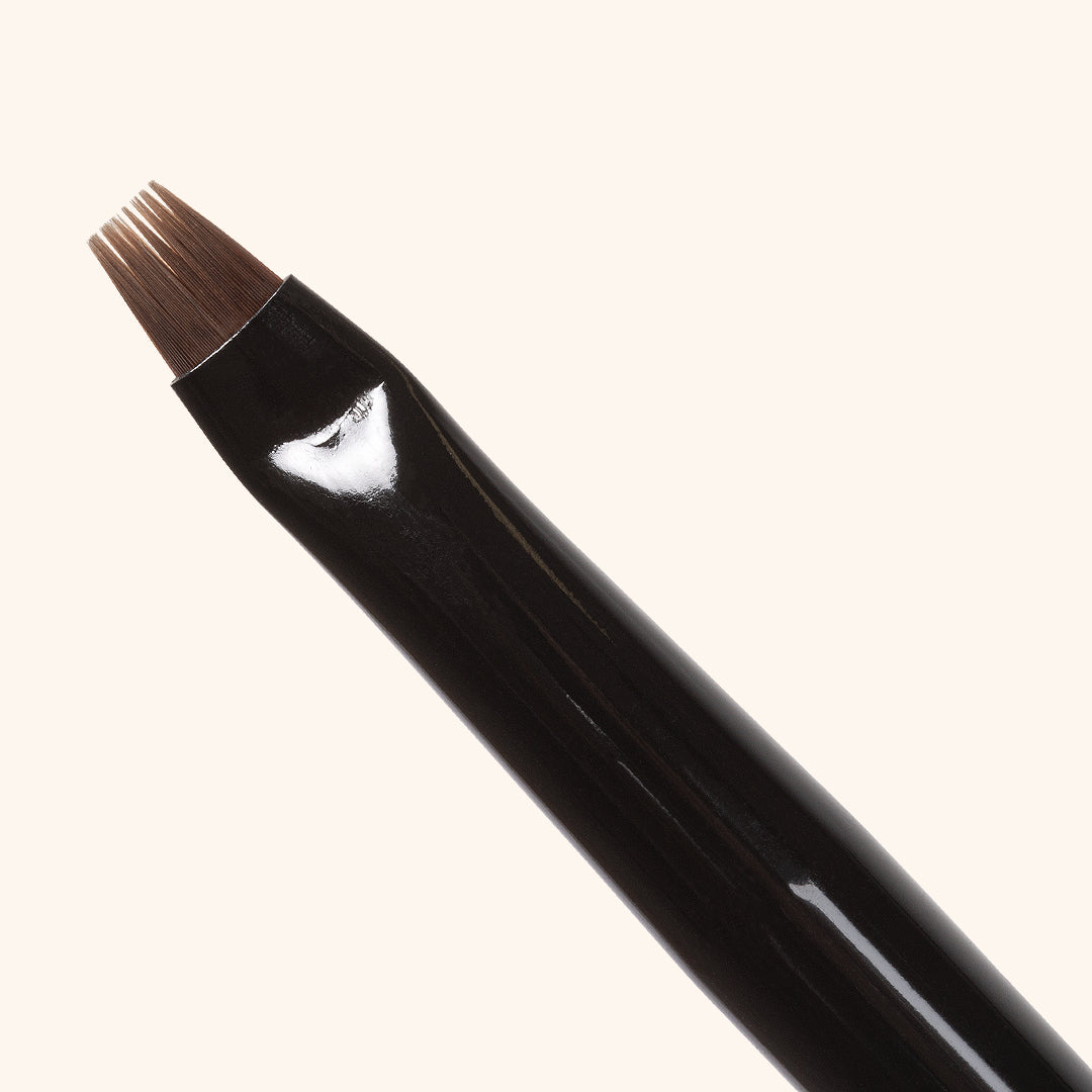 Close up of a So Henna flat brow brush