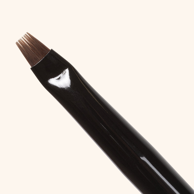 Close up of a So Henna flat brow brush
