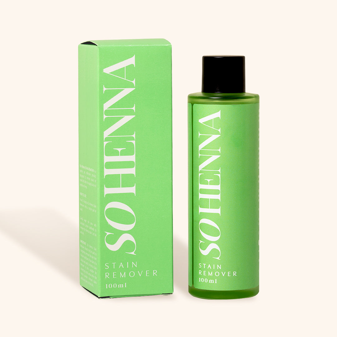 bright green 100 ml bottle with black cap next to green box packaging wiht writing So Henna Stain Remover