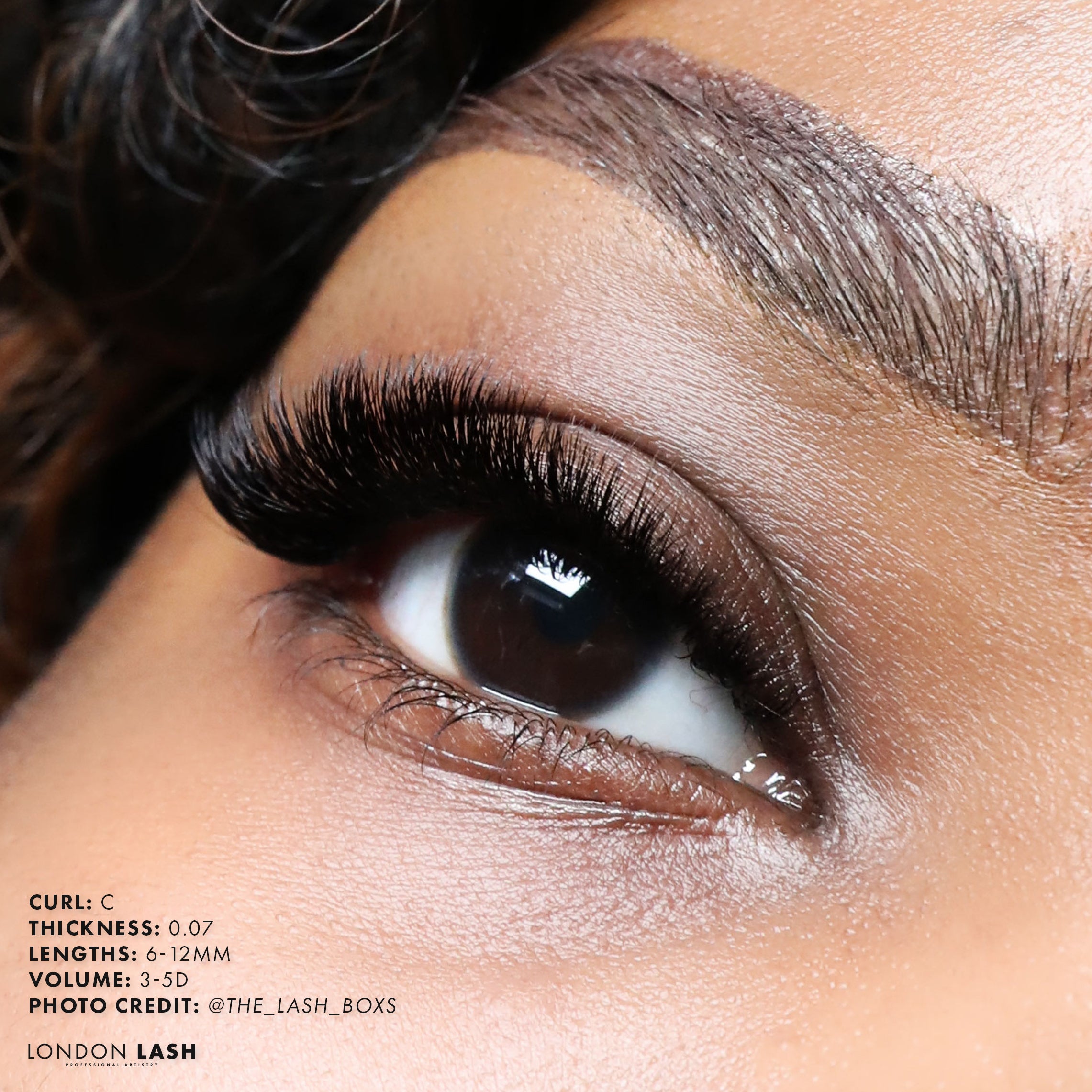 a set of volume lashes on a model using C curl lashes