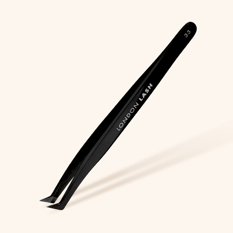 Close-up of Fiber Tip Eyelash Extensions Tweezers for precise lash application
